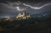 Torrechiara Castle under the storm, province of Parma, Emilia Romagna, Italy