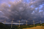 Millau Viaduct, cable-stayed bridge spanning the Tarn valley, Aveyron department, France. Carrying the A75 motorway, it joins the Causse Rouge and Causse du Larzac, crossing a gap 2,460 meters long and 343 meters deep at its highest point.