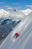 Skier in powder snow, Rosa Kutor, Sochi, Caucasus, Russia