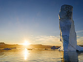 Landscape with icebergs in the Sermilik (Sermiligaaq) Icefjord in the Ammassalik area in East Greenland. North America, Greenland, Ammassallik, Danish Territory, autumn