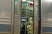 A views about the metros world. moviments and isolation are the key  to read this places-New York-