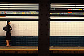 A views about the metros world. moviments and isolation are the key  to read this places-New York-
