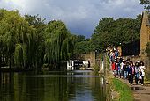United Kingdom London Regent's Canal Hiking along the canal in the nearest of the Victoria Park and the Old Ford lock in background.