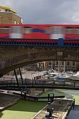 United Kingdom London Regent's Canal Limehouse Basin - The Commercial Road Lock and the railway.