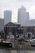 United Kingdom London Regent's Canal Limehouse Basin and Canary Wharf skyline.