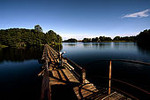 Trakai, Lithuania: fishing on the floating bridge that provides a boarderline between the Galves lake and the Bernardinu lake;