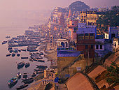 Varanasi's ghats emerging the fog at dawn.