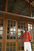 Doorman at the entrance to the Tea Factory Hotel, Nuwara Eliya, Central Province, Sri Lanka