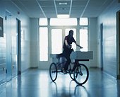 Blurry Woman on Delivery Bike
