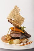 Cannon of lamb served with oriental vegetables
