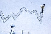 high angle view of child and chart drawn into the snow