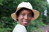 portrait of beautiful smiling woman on a walk in the bush.