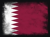 Qatar Flag design composition of exploding powder and paint, isolated on a black background for copy space. Colorful abstract dust particles explosion. World cup 2022 football symbol for printing