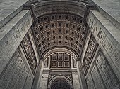View underneath triumphal Arch, in Paris, France. Architectural details of the famous Arc de triomphe landmark