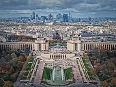 Sightseeing aerial view of the Trocadero area and La Defense metropolitan district seen at the horizon in Paris, France. Beautiful autumn season colors
