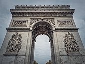 Triumphal Arch (Arc de triomphe) in Paris, France. Closeup architectural details of the famous historic landmark