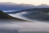 Early morning fog over valleys and mountains, Serra da Canastra, Minas Gerais state, Brazil, South America