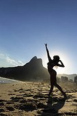 beautiful dancer performing on the beach, Rio de Janeiro