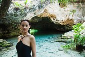 Portrait of young woman in swimsuit, Grande Cenote, Quintana Roo, Tulum, Mexico