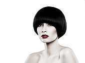 Young woman with black bob looking away
