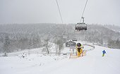 Ski slope in snowfall