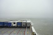 Ferry on North Sea leaving Port of Rotterdam during storm, Netherlands