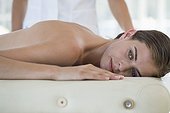 Woman receiving massage from a massage therapist
