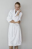 Portrait of a woman in bathrobe at spa