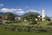 Costa Rica - La Fortuna - Central park and catholic church - In background the Arenal volcano