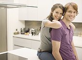 Couple posing in kitchen