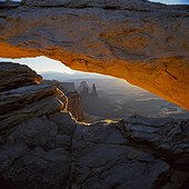 Arch in desert landscape