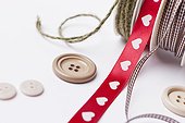 Close up of ribbon, string and buttons