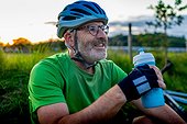 Cyclist with water bottle