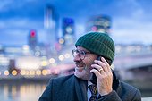 Man on phone in city, London, UK