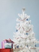 Christmas tree with gifts piled high