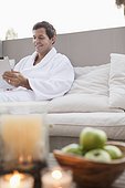 Man using tablet pc in spa
