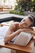 Woman relaxing in health spa