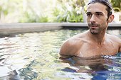 Portrait of man in spa pool