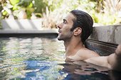 Man relaxing in pool