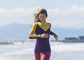 Young woman in a wetsuit.