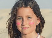 Portrait of a young girl with sunscreen.