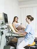 pregnant woman receiving ultasound examination