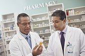 Close-up view of pharmacists at work