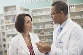 Close-up view of pharmacists at work