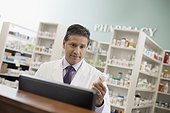 Close-up view of pharmacist at work