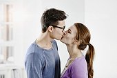 Berlin, Germany, Young couple kissing