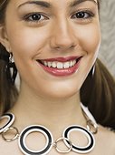 Smiling Woman Wearing Vintage Necklace