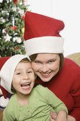 Mother and Daughter Wearing Santa Hats