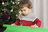 Boy Holding Wrapping Paper