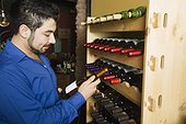 Man Selecting a Bottle of Wine
